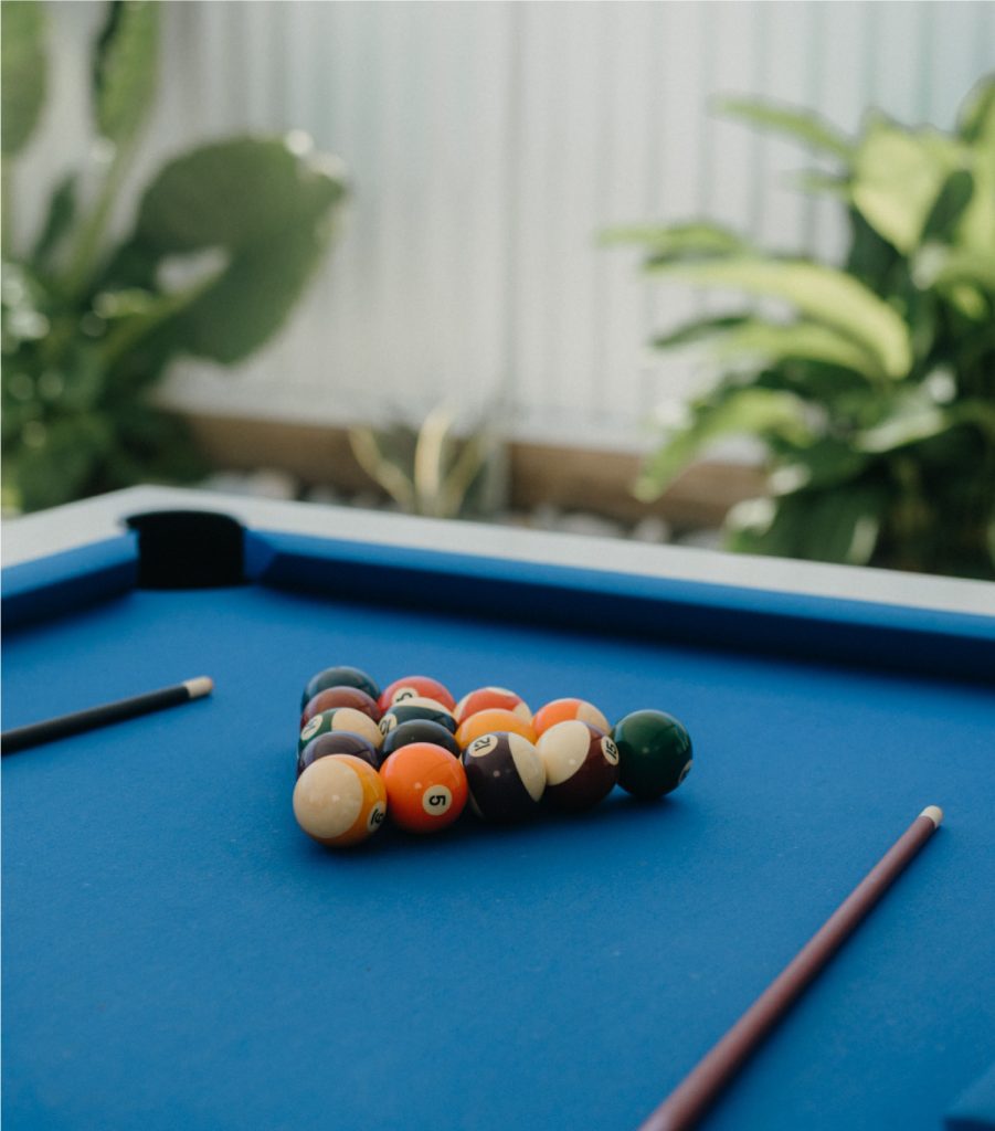 Australian outdoor pool table with white frame and blue felt